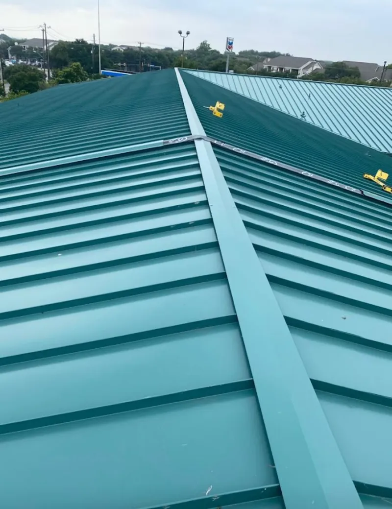 Green commercial metal roof ridge and valley for Metal Roof Repair in Rosemount